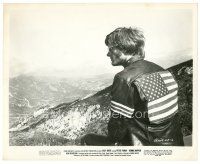 2g279 EASY RIDER 8x10 still '69 Peter Fonda c/u in leather jacket w/flag looking over mountains!