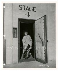 2g454 JET PILOT candid 8x10 key book still '57 Janet Leigh standing by padded sound stage door!