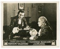 2g571 MONSIEUR BEAUCAIRE 8x10 LC '24 Rudolph Valentino offering drink to man who is not amused!