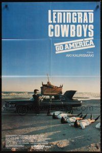 2j506 LENINGRAD COWBOYS GO AMERICA 1sh '90 great wacky image of band on beach w/black Cadillac!