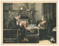 2p337 BRAT LC '19 Charles Bryant sits with pretty Nazimova asleep by fireplace!