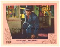 2p933 THIEF LC #7 '52 close up of Ray Milland in trench coat & hat crouching on street!
