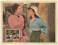 2p958 UNDER TWO FLAGS LC R43 Claudette Colbert in legionnaire hat glares at Rosalind Russell!
