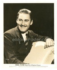 2s288 ERROL FLYNN 8x10 still '30s great close up smiling portrait seated on couch!