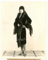 2s293 EVELYN BRENT 8x10 news photo '28 modeling a coat of brown velveteen trimmed with sable!