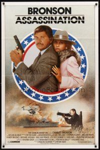 2w066 ASSASSINATION 1sh '86 close-up of Charles Bronson with Jill Ireland, rocket launcher!