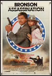 2w067 ASSASSINATION video 1sh '86 close-up of Charles Bronson with Jill Ireland, rocket launcher!