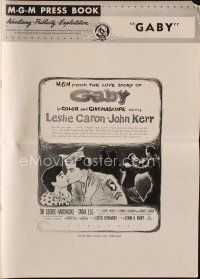 3a799 GABY pressbook '56 wonderful close up art of soldier John Kerr kissing Leslie Caron!