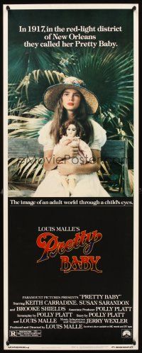 2y568 PRETTY BABY insert '78 directed by Louis Malle, young Brooke Shields sitting with doll