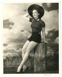 3c682 NINA GILBERT deluxe 8x10 still '30s full-length seated on stump in skimpy outfit by Frederick