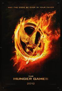 3f349 HUNGER GAMES teaser DS 1sh '12 Harrelson, may the odds be in your favor, cool bird logo!