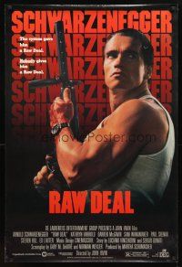 3f628 RAW DEAL 1sh '86 great close up of tough guy Arnold Schwarzenegger with gun!