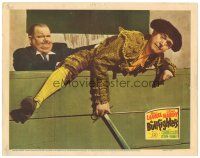 3e245 BULLFIGHTERS LC '45 wacky close up of Oliver Hardy pushing matador Stan Laurel into ring!