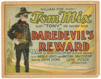 3e043 DAREDEVIL'S REWARD TC '28 great image of masked cowboy Tom Mix pointing his gun!