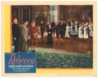 3e744 REBECCA LC R46 house staff members stare at Laurence Olivier & Joan Fontaine, Hitchcock!