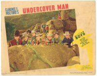 3e927 UNDERCOVER MAN LC '42 William Boyd as Hopalong Cassidy taking cover with men behind rocks!