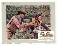 3e954 WAR WAGON LC #3 '67 close up of cowboys John Wayne & Kirk Douglas scouting ahead!