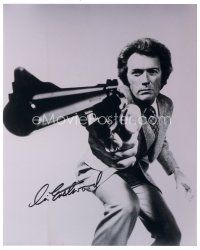 3j166 CLINT EASTWOOD signed w/COA 8x10 REPRO still '85 by Eastwood, most classic Dirty Harry image!