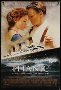 3z798 TITANIC style B int'l DS 1sh '97 great romantic image of Leonardo DiCaprio & Kate Winslet!