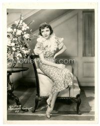 4b196 CLAUDETTE COLBERT 8x10 still '35 full-length seated close up from She Married Her Boss!