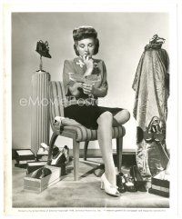 4b268 EVELYN ANKERS 8x10 still '44 close up surrounded by shoes & reading War Ration Book!