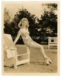 4b448 JANIS CARTER 8x10 still '40s full-length in sexy two-piece swimsuit sitting on chair!