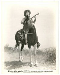 4b788 SONG OF THE SADDLE 8x10 still '36 singing cowboy Dick Foran with guitar on horseback!