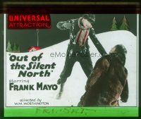 4e118 OUT OF THE SILENT NORTH glass slide '22 c/u of Frank Mayo beating up bad guy in the snow!