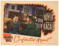 4d324 CONFIDENTIAL AGENT LC '45 close up of Charles Boyer pointing his gun at Peter Lorre!