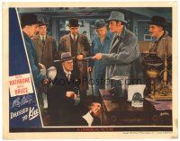 4d372 DRESSED TO KILL LC '46 Basil Rathbone as Sherlock Holmes shows evidence to policemen!