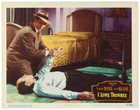 4d509 I LOVE TROUBLE LC #7 '47 close up of Franchot Tone checking unconscious man's pulse!