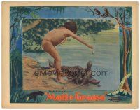 4d612 MATTO GROSSO LC '33 close up of young Brazilian boy feeding fish to otters, cool border art!
