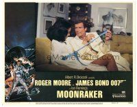 4d632 MOONRAKER LC #1 '79 Roger Moore as James Bond unwraps sexy Bond girl!