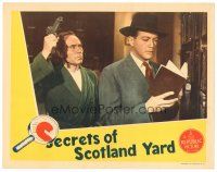 4d796 SECRETS OF SCOTLAND YARD LC '44 close up of Edgar Barrier about to get pistol-whipped!