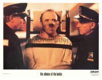 4d816 SILENCE OF THE LAMBS LC '91 classic close up of Anthony Hopkins in restraints with cops!