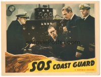 4d845 SOS COAST GUARD LC '42 close of military officers at communications radio!