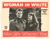 4d983 WOMAN IN WHITE LC #2 '48 close up of pretty Alexis Smith looking up at Gig Young!