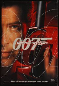 4k641 TOMORROW NEVER DIES teaser DS 1sh '97 super close image of Pierce Brosnan as James Bond 007!