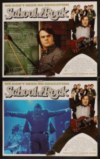 4h592 SCHOOL OF ROCK 8 LCs '03 great close image of teacher Jack Black playing guitar!