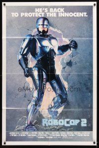 4w712 ROBOCOP 2 int'l 1sh '90 cyborg policeman Peter Weller busts through wall, scii-fi sequel!