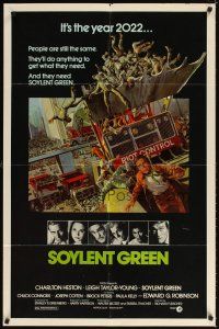 4w733 SOYLENT GREEN 1sh '73 art of Charlton Heston trying to escape riot control by John Solie!