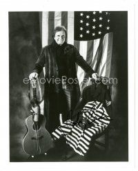 5a781 JOHNNY CASH signed 8x10 REPRO still '90s w/ guitar, American flag, uniform & prison clothes!