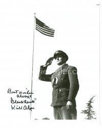 5a796 KIRK ALYN signed 8x10 REPRO still '80s close up saluting as Blackhawk by American flag!