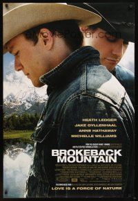 5a108 BROKEBACK MOUNTAIN signed DS 1sh '05 by Ang Lee, c/u of Heath Ledger & Jake Gyllenhaal