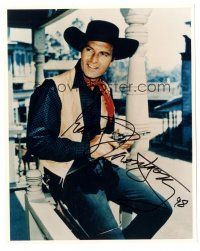 5a732 GEORGE MONTGOMERY signed color 8x10 REPRO still '98 great smiling cowboy portrait with gun!
