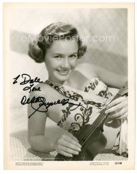5a477 DEBBIE REYNOLDS signed 8x10 still '52 smiling c/u with ukulele from Singin' In The Rain!