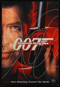 5b725 TOMORROW NEVER DIES teaser DS 1sh '97 super close image of Pierce Brosnan as James Bond 007!