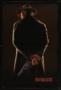 5b758 UNFORGIVEN undated teaser 1sh '92 classic image of gunslinger Clint Eastwood w/back turned!