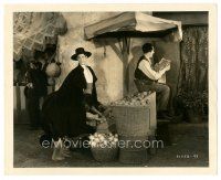 5d469 IN GAY MADRID 8x10 still '30 Ramon Novarro hides kids under his cape as they steal fruit!