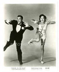 5d847 SINGIN' IN THE RAIN 8x10 still '52 c/u Gene Kelly in tuxedo dancing with Debbie Reynolds!
